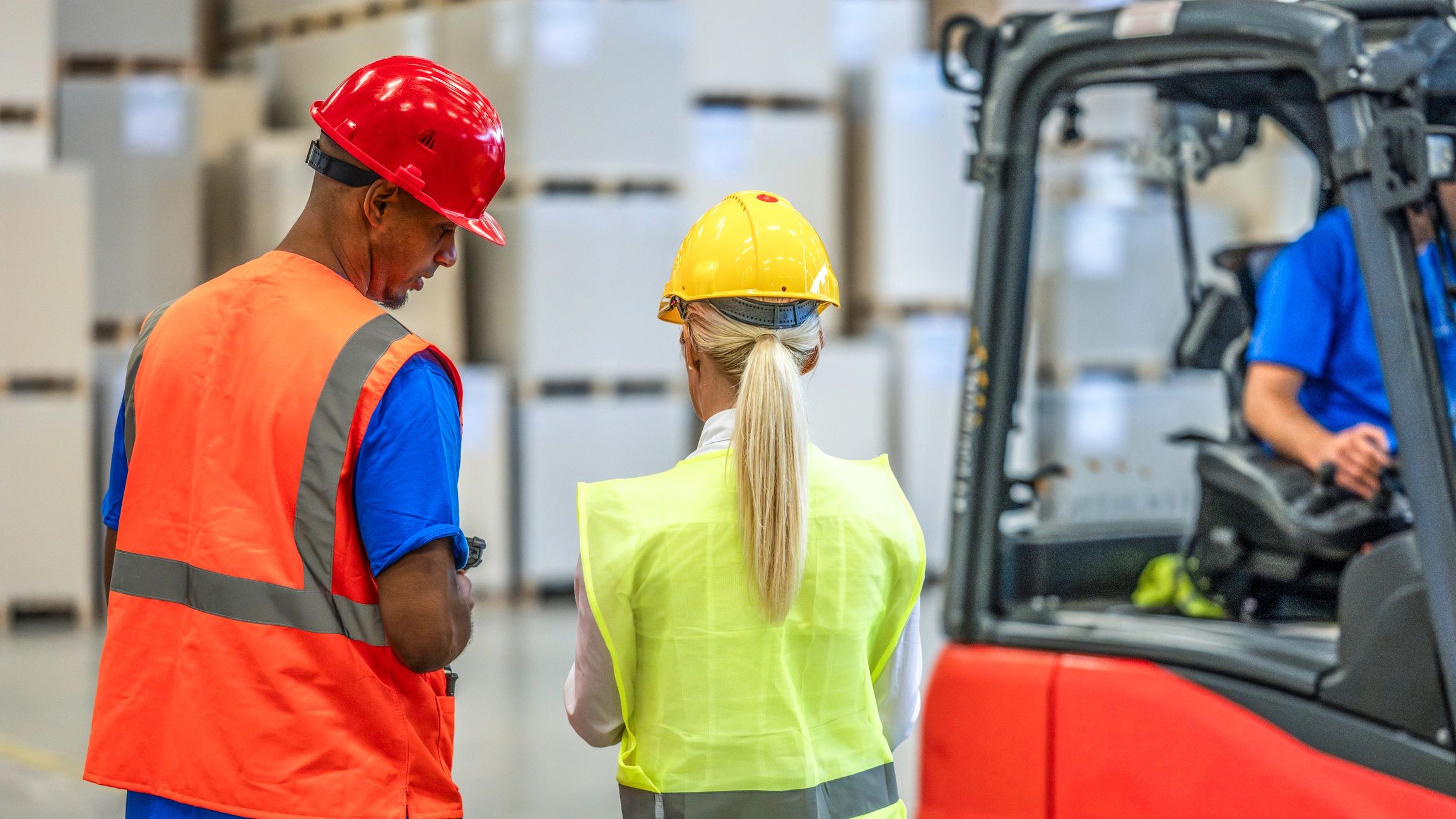 Logistics team reviewing warehouse operations